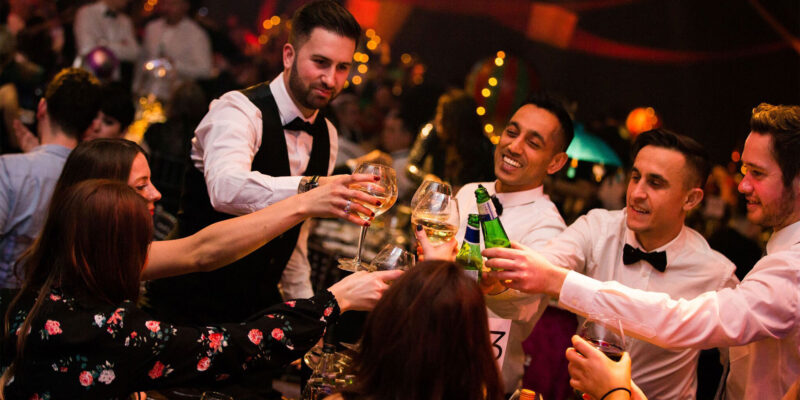 Guests cheering to the new year at London New Year's Eve Ball